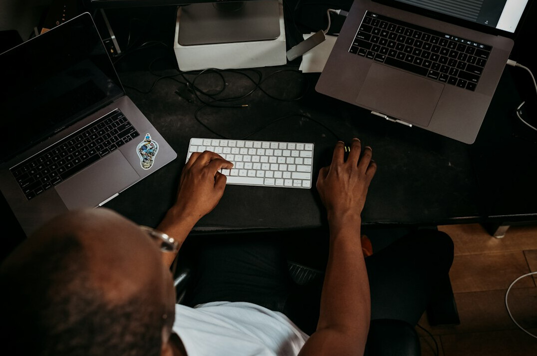 beginner programmer at desk